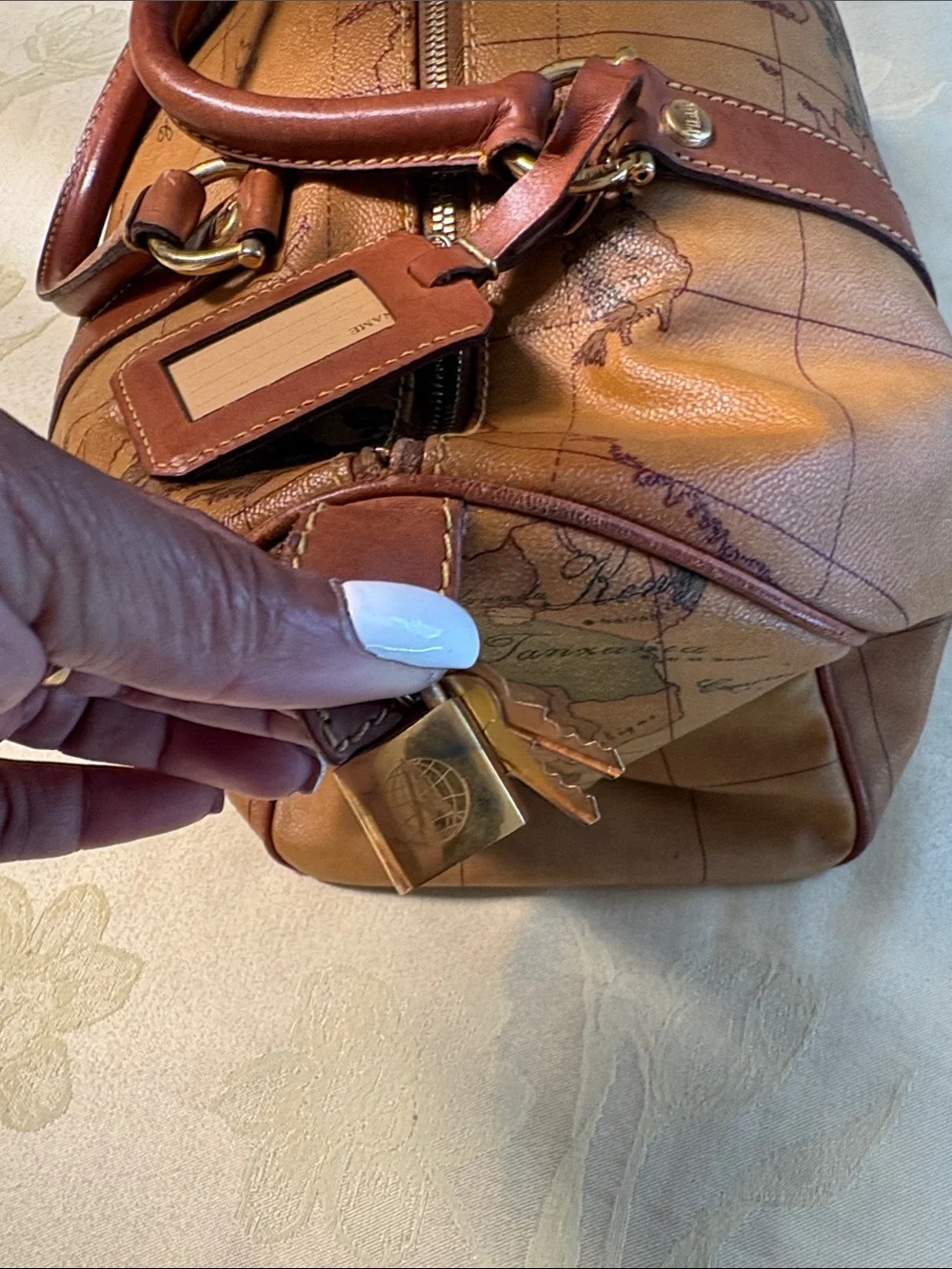 Alviero Martini Tan and Brown Geo-Print Leather Duffel